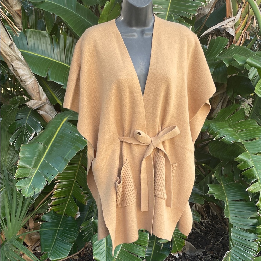 cape or sweater jacket.